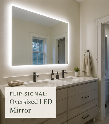 modern mirror in older bathroom